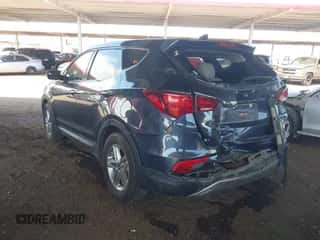 2017 Hyundai Santa Fe 2.4L z VIN 5XYZTDLB8HG442615, wystawiony jako IAAI lot #43259931 z przebiegiem 99 650 mil mil oraz . Historia ofert i sprzedaży dostępna na DreamBid. Obrazek 3.