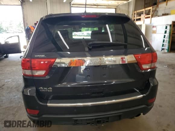 2012 Jeep Grand Cherokee Limited z VIN 1C4RJFBG4CC217832, wystawiony jako Copart lot #64059795 z przebiegiem 113 251 mil mil oraz Szkoda całkowita • Salvage title. Historia ofert i sprzedaży dostępna na DreamBid. Obrazek 6.