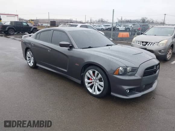 2014 Dodge Charger SRT-8 с VIN 2C3CDXEJ0EH250650, выставлен на аукционе IAAI как лот 41486045 с пробегом 122 018 миль миль и . История ставок и продаж доступна на DreamBid. Изображение 1.
