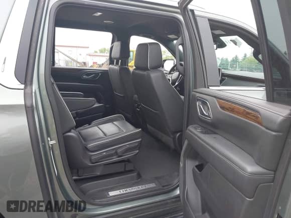 2023 Chevrolet Suburban Premier with VIN 1GNSCFKD3PR280397, listed as a IAAI auction lot 42448316 with 79,458 mi miles and . Bid and sale history available at DreamBid. Image 8.