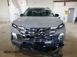 2024 Hyundai Santa Cruz Night Edition с VIN 5NTJCDAF1RH084322, выставлен на аукционе Copart как лот 71028344 с пробегом 4 125 миль миль и Списание • Salvage title. История ставок и продаж доступна на DreamBid. Изображение 5.