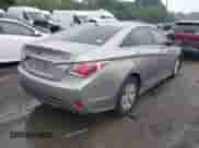 2011 Hyundai Sonata Hybrid with VIN KMHEC4A44BA004891, listed as a IAAI auction lot 42879359 with 113,962 mi miles and . Bid and sale history available at DreamBid. Image 4.