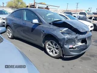 2023 Tesla Model Y Long Range with VIN 7SAYGDEE5PF865572, listed as a IAAI auction lot 43067262 with 56,508 mi miles and . Bid and sale history available at DreamBid. Image 1.