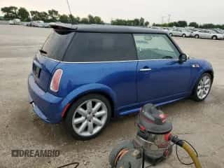 2005 MINI Hardtop S with VIN WMWRE33555TG96166, listed as a Copart auction lot 58917425 with 87,344 mi miles and Salvage title. Bid and sale history available at DreamBid. Image 3.