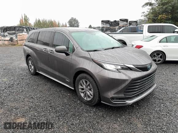2021 Toyota Sienna LE with VIN 5TDKSKFC7MS005604, listed as a Copart auction lot 87423155 with 74,893 mi miles and Salvage title. Bid and sale history available at DreamBid. Image 1.