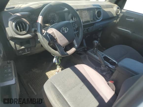 2019 Toyota Tacoma SR5 с VIN 3TMDZ5BN5KM079663, выставлен на аукционе Copart как лот 62890345 с пробегом 60 246 миль миль и Списание • Salvage title. История ставок и продаж доступна на DreamBid. Изображение 8.