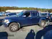2006 Nissan Frontier SE with VIN 1N6AD07W86C401240, listed as a Copart auction lot 87023625 with 252,639 mi miles and Salvage title. Bid and sale history available at DreamBid. Image 1.