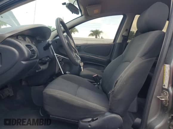 2005 Dodge Neon SXT z VIN 1B3ES56C95D237635, wystawiony jako Copart lot #66286485 z przebiegiem 190 521 mil mil oraz Szkoda całkowita • Salvage title. Historia ofert i sprzedaży dostępna na DreamBid. Obrazek 7.