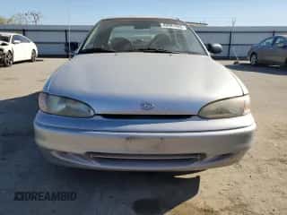 1996 Hyundai Accent with VIN KMHVF14N4TU316378, listed as a Copart auction lot 88981945 with 128,650 mi miles and Clean title. Bid and sale history available at DreamBid. Image 5.