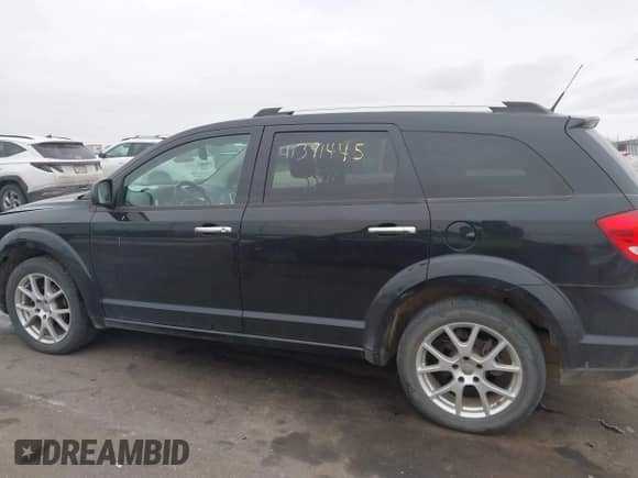 2011 Dodge Journey Crew with VIN 3D4PH3FG9BT530313, listed as a IAAI auction lot 41391445 with 144,698 mi miles and . Bid and sale history available at DreamBid. Image 14.