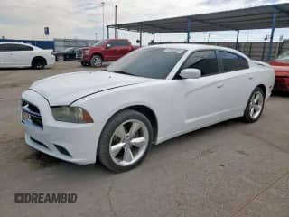 2013 Dodge Charger SXT Plus z VIN 2C3CDXHG4DH729782, wystawiony jako Copart lot #62903225 z przebiegiem 168 867 mil mil oraz Czysty tytuł • Clean title. Historia ofert i sprzedaży dostępna na DreamBid. Obrazek 1.
