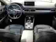 2024 Mazda CX-5 S Preferred z VIN JM3KFBCL5R0421113, wystawiony jako Copart lot #80189985 z przebiegiem 23 283 mil mil oraz Szkoda całkowita • Salvage title. Historia ofert i sprzedaży dostępna na DreamBid. Obrazek 8.
