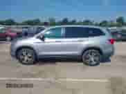 2017 Honda Pilot EX-L with VIN 5FNYF6H77HB069321, listed as a IAAI auction lot 42880282 with 110,987 mi miles and . Bid and sale history available at DreamBid. Image 14.