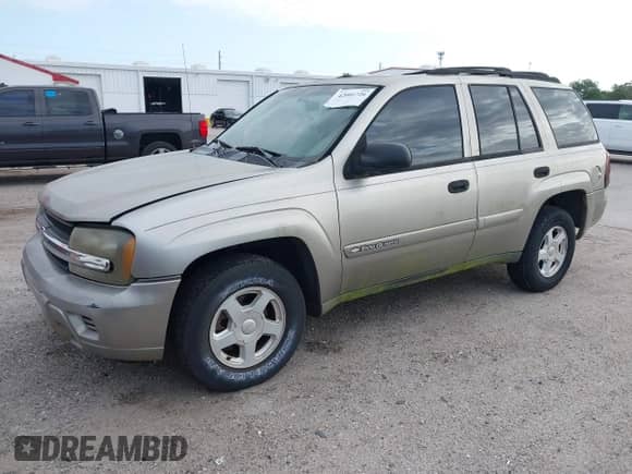 2002 Chevrolet TrailBlazer LTZ with VIN 1GNDS13S422222859, listed as a IAAI auction lot 42001726 with 288,530 mi miles and . Bid and sale history available at DreamBid. Image 2.