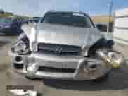 2005 Hyundai Tucson GL z VIN KM8JM12B05U069649, wystawiony jako Copart lot #66017225 z przebiegiem 104 931 mil mil oraz Szkoda całkowita • Salvage title. Historia ofert i sprzedaży dostępna na DreamBid. Obrazek 5.