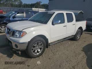 2019 Nissan Frontier SL with VIN 1N6AD0EVXKN771419, listed as a Copart auction lot 69157914 with 111,635 mi miles and Salvage title. Bid and sale history available at DreamBid. Image 1.