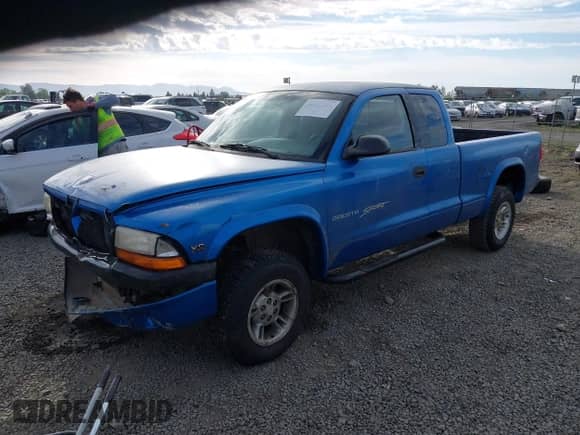 1998 Dodge Dakota SLT with VIN 1B7GG22Y6WS546615, listed as a IAAI auction lot 42193501 with 146,376 mi miles and . Bid and sale history available at DreamBid. Image 2.