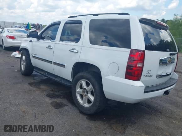 2007 Chevrolet Tahoe LS with VIN 1GNFC13C87J264964, listed as a IAAI auction lot 42640675 with Not provided miles and . Bid and sale history available at DreamBid. Image 3.