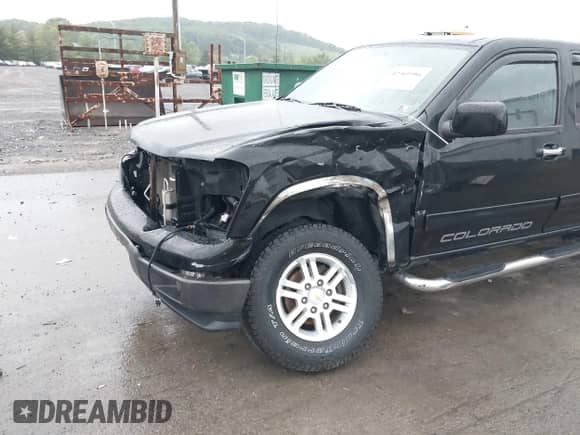 2012 Chevrolet Colorado 1LT с VIN 1GCHTCFEXC8165154, выставлен на аукционе IAAI как лот 42301986 с пробегом 166 527 миль миль и . История ставок и продаж доступна на DreamBid. Изображение 6.