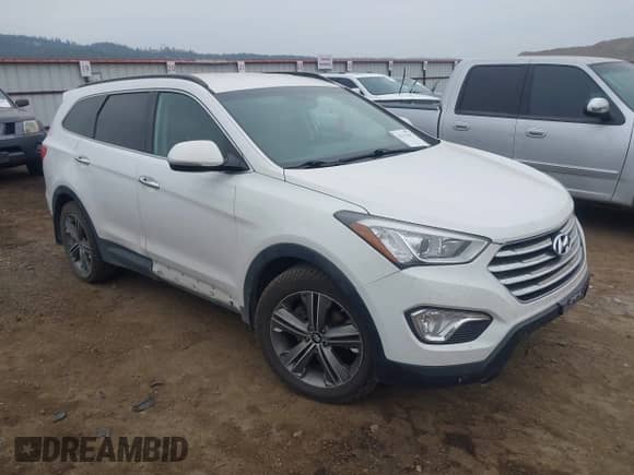 2014 Hyundai Santa Fe Limited z VIN KM8SNDHF9EU071221, wystawiony jako IAAI lot #43312415 z przebiegiem 152 481 mil mil oraz . Historia ofert i sprzedaży dostępna na DreamBid. Obrazek 1.