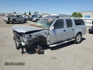 2001 Nissan Frontier SC SuperCharger z VIN 1N6MD27Y61C389396, wystawiony jako Copart lot #67128365 z przebiegiem 64 710 mil mil oraz Czysty tytuł • Clean title. Historia ofert i sprzedaży dostępna na DreamBid. Obrazek 1.