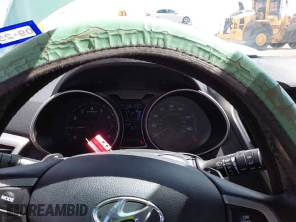 2012 Hyundai Veloster w/Gray Int z VIN KMHTC6AD6CU052668, wystawiony jako IAAI lot #43165096 z przebiegiem 156 135 mil mil oraz . Historia ofert i sprzedaży dostępna na DreamBid. Obrazek 7.