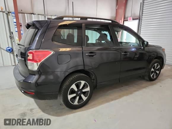2018 Subaru Forester Premium z VIN JF2SJAGC0JH521624, wystawiony jako Copart lot #84973705 z przebiegiem 68 558 mil mil oraz Czysty tytuł • Clean title. Historia ofert i sprzedaży dostępna na DreamBid. Obrazek 3.