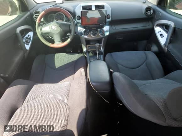 2006 Toyota RAV4 Sport with VIN JTMBK32V465012225, listed as a Copart auction lot 71456945 with 97,084 mi miles and Salvage title. Bid and sale history available at DreamBid. Image 8.