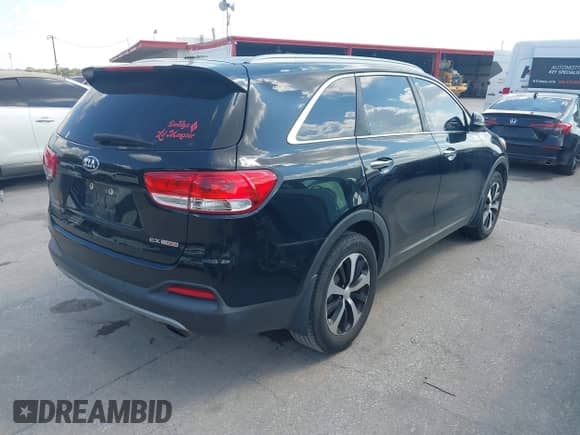 2018 Kia Sorento EX with VIN 5XYPH4A11JG403244, listed as a IAAI auction lot 43359705 with 87,891 mi miles and . Bid and sale history available at DreamBid. Image 4.