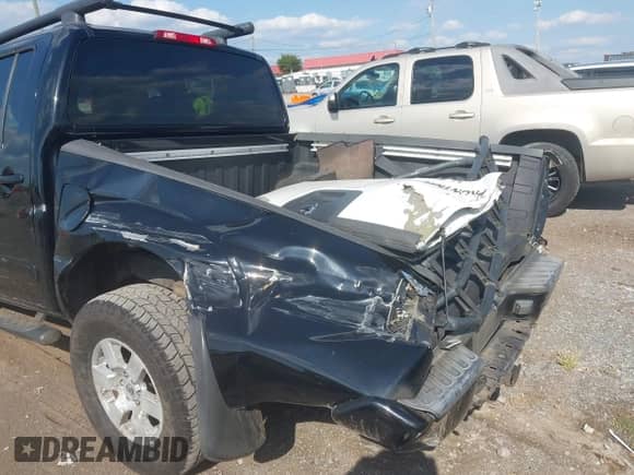 2005 Nissan Frontier SE with VIN 1N6AD07UX5C418604, listed as a IAAI auction lot 43196214 with 252,593 mi miles and . Bid and sale history available at DreamBid. Image 6.