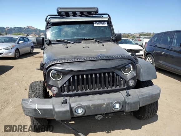 2018 Jeep Wrangler Sport S with VIN 1C4GJWAGXJL811914, listed as a Copart auction lot 65130075 with 88,622 mi miles and Salvage title. Bid and sale history available at DreamBid. Image 5.