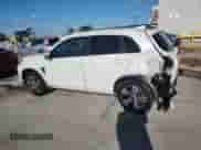 2021 Mitsubishi Outlander SE z VIN JA4APVAUXMU015757, wystawiony jako Copart lot #85944485 z przebiegiem 106 985 mil mil oraz Szkoda całkowita • Salvage title. Historia ofert i sprzedaży dostępna na DreamBid. Obrazek 2.