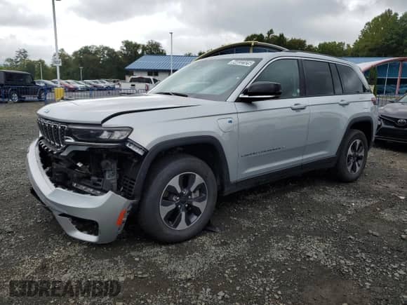 2023 Jeep Grand Cherokee with VIN 1C4RJYB64PC649720, listed as a Copart auction lot 84032325 with 59,572 mi miles and Clean title. Bid and sale history available at DreamBid. Image 1.
