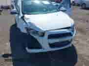 2016 Chevrolet Sonic LS z VIN 1G1JA6SG1G4178123, wystawiony jako IAAI lot #42289322 z przebiegiem 156 422 mil mil oraz . Historia ofert i sprzedaży dostępna na DreamBid. Obrazek 6.