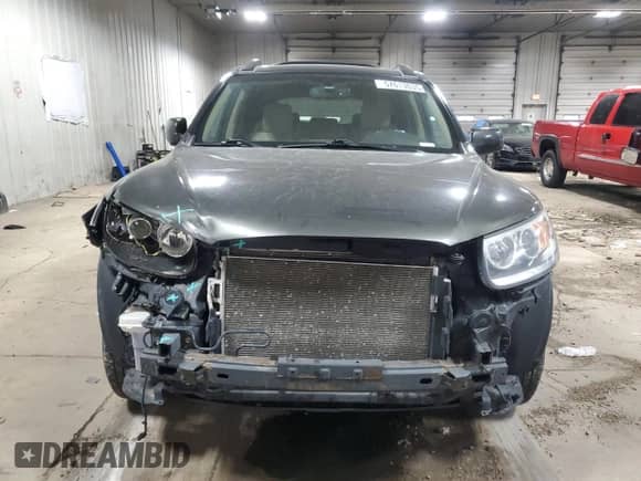 2012 Hyundai Santa Fe Limited с VIN 5XYZK4AG9CG148019, выставлен на аукционе Copart как лот 57613035 с пробегом 179 306 миль миль и На запчасти • Non repairable. История ставок и продаж доступна на DreamBid. Изображение 5.