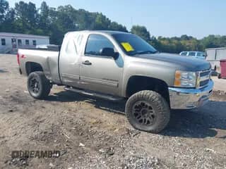 2013 Chevrolet Silverado 1500 LT with VIN 1GCRCSE08DZ332935, listed as a IAAI auction lot 43256335 with 132,902 mi miles and . Bid and sale history available at DreamBid. Image 1.