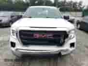 2021 GMC Sierra 1500 with VIN 1GTR8AEHXMZ268057, listed as a Copart auction lot 58497265 with 57,073 mi miles and Salvage title. Bid and sale history available at DreamBid. Image 5.