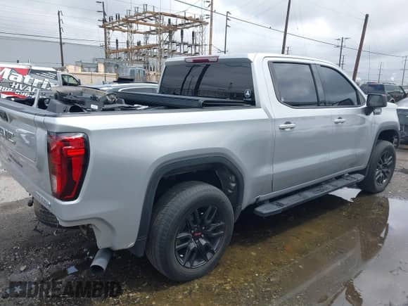 2022 GMC Sierra 1500 Elevation with VIN 1GTPHCED9NZ577469, listed as a IAAI auction lot 42173567 with 42,866 mi miles and . Bid and sale history available at DreamBid. Image 4.