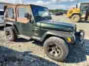 1997 Jeep Wrangler Sport with VIN 1J4FY19S0VP430844, listed as a Copart auction lot 65827275 with 91,868 mi miles and Salvage title. Bid and sale history available at DreamBid. Image 4.
