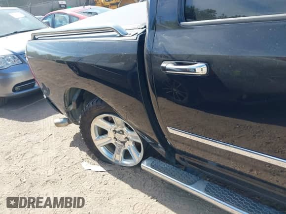 2015 Ram 1500 Laramie Longhorn with VIN 1C6RR7PT9FS515945, listed as a IAAI auction lot 42706618 with 153,693 mi miles and . Bid and sale history available at DreamBid. Image 6.