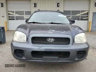 2004 Hyundai Santa Fe z VIN KM8SB12B84U661471, wystawiony jako Copart lot #83245224 z przebiegiem 137 094 mil mil oraz Szkoda całkowita • Salvage title. Historia ofert i sprzedaży dostępna na DreamBid. Obrazek 5.