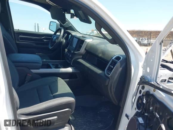 2023 Ram 1500 Big Horn with VIN 1C6SRFMTXPN670827, listed as a IAAI auction lot 42626215 with 22,172 mi miles and . Bid and sale history available at DreamBid. Image 5.