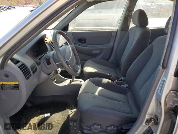 2005 Hyundai Accent GLS с VIN KMHCG45C75U638812, выставлен на аукционе Copart как лот 77968234 с пробегом 130 815 миль миль и Списание • Salvage title. История ставок и продаж доступна на DreamBid. Изображение 7.