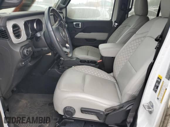 2022 Jeep Wrangler Unlimited Sahara with VIN 1C4JJXP6XNW207648, listed as a Copart auction lot 58209795 with 35,306 mi miles and Salvage title. Bid and sale history available at DreamBid. Image 7.