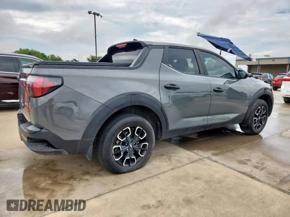 2024 Hyundai Santa Cruz SEL с VIN 5NTJBDAE0RH079803, выставлен на аукционе Copart как лот 68621445 с пробегом 89 955 миль миль и Чистый • Clean title. История ставок и продаж доступна на DreamBid. Изображение 3.