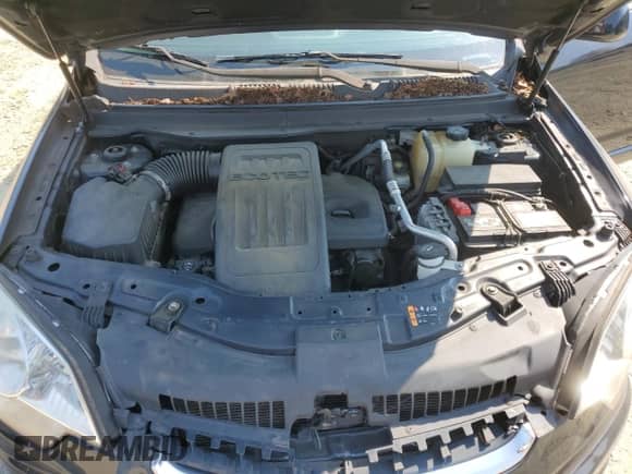 2014 Chevrolet Captiva Sport LT z VIN 3GNAL3EK7ES669283, wystawiony jako Copart lot #62049454 z przebiegiem 103 894 mil mil oraz Szkoda całkowita • Salvage title. Historia ofert i sprzedaży dostępna na DreamBid. Obrazek 12.