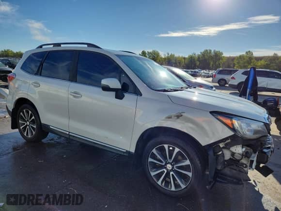 2017 Subaru Forester Touring z VIN JF2SJGWC3HH481294, wystawiony jako Copart lot #84467565 z przebiegiem 153 950 mil mil oraz Szkoda całkowita • Salvage title. Historia ofert i sprzedaży dostępna na DreamBid. Obrazek 4.