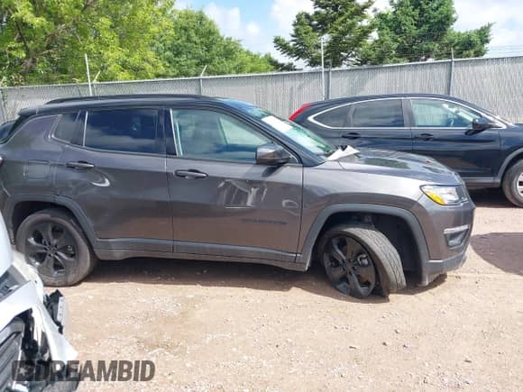 2019 Jeep Compass Latitude with VIN 3C4NJDBB3KT638113, listed as a IAAI auction lot 42510167 with 69,034 mi miles and . Bid and sale history available at DreamBid. Image 13.
