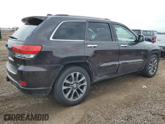 2017 Jeep Grand Cherokee Overland с VIN 1C4RJFCG7HC620337, выставлен на аукционе Copart как лот 85735145 с пробегом 78 493 миль миль и Списание • Salvage title. История ставок и продаж доступна на DreamBid. Изображение 3.