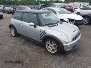 2006 MINI Hardtop S with VIN WMWRE33556TJ37120, listed as a IAAI auction lot 42601923 with 51,501 mi miles and . Bid and sale history available at DreamBid. Image 1.